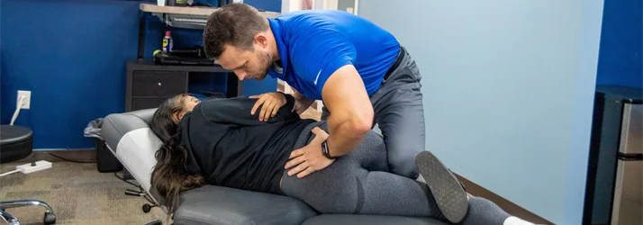 Chiropractor Fishers IN Ian Boone Back Pain Adjustment